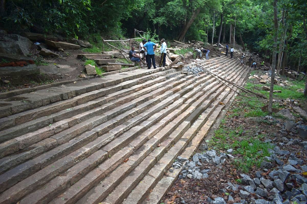 The stepped wall of the pond