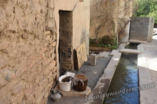 Working falaj (water channel system) at Al Manah Working falaj (water channel system) at Al Manah