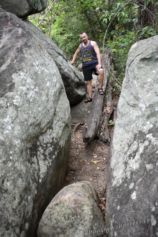 The path around the drip-ledge caves zone is narrow at places The path around the drip-ledge caves zone is narrow at places